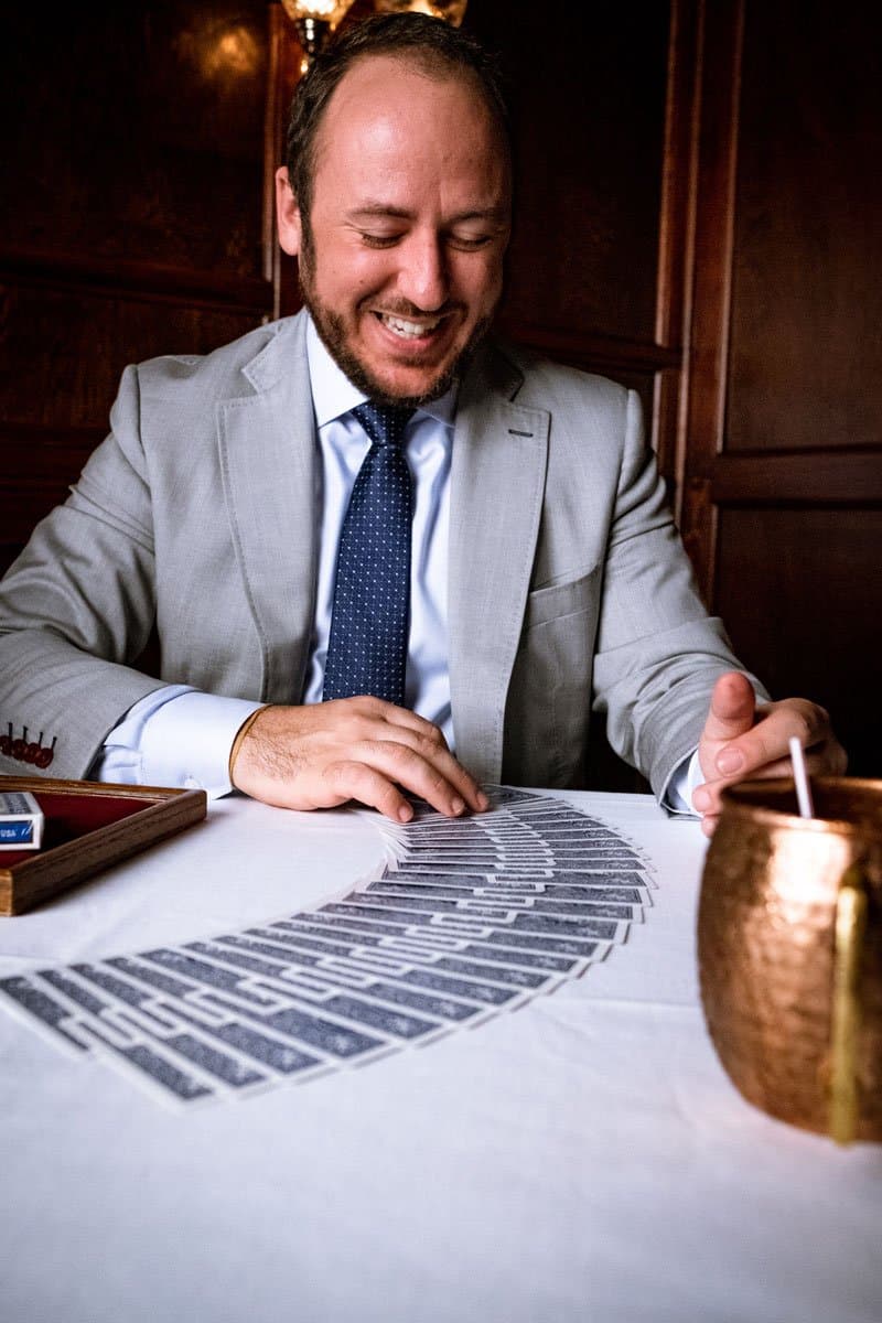 Professional magician performing at a Dallas event